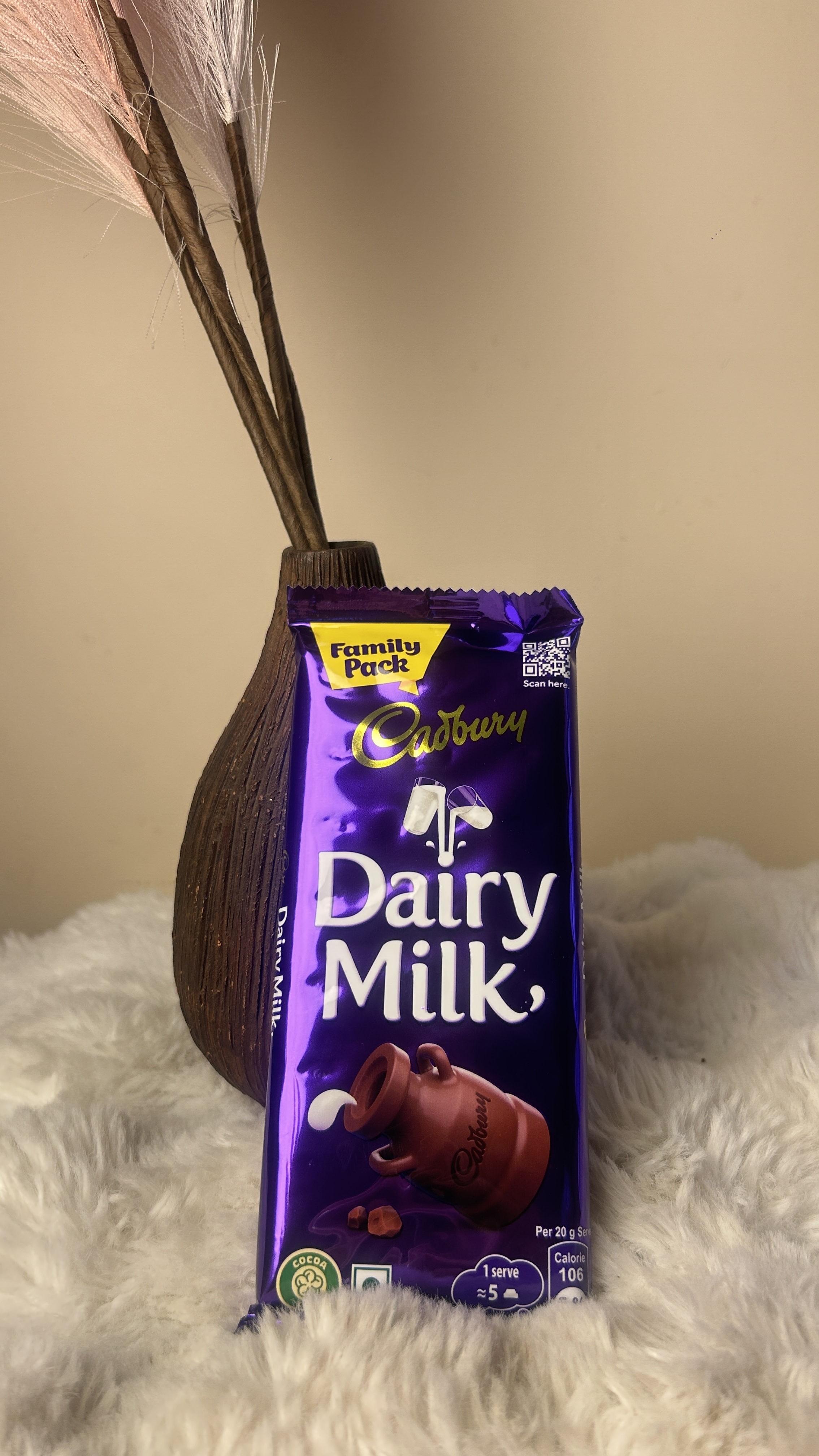 Dairy Milk Sharing Bar A generously sized bar of smooth and creamy Dairy Milk chocolate, perfect for sharing with family and friends.