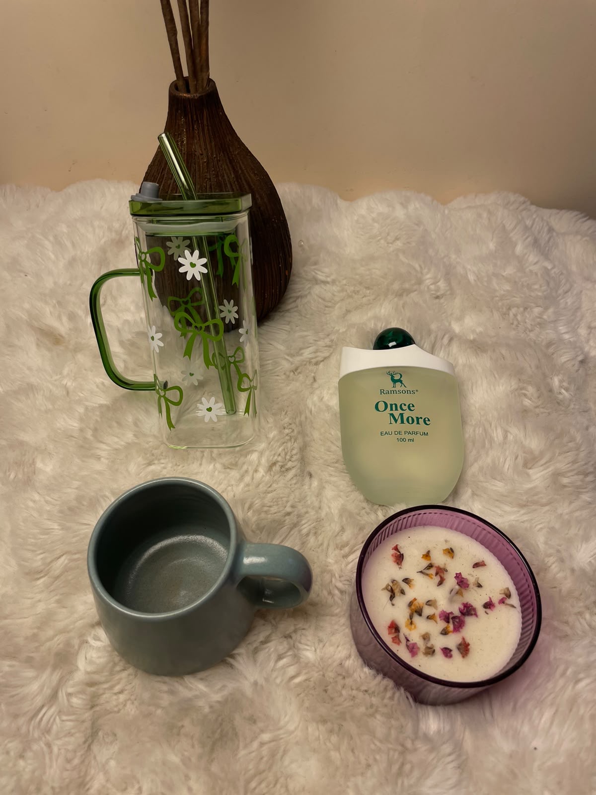 Premium Lifestyle Hamper A refined corporate gift set featuring a glass tumbler, cup, perfume for him, and a scented candle. The combination is practical, elegant, and suitable for festive occasions.