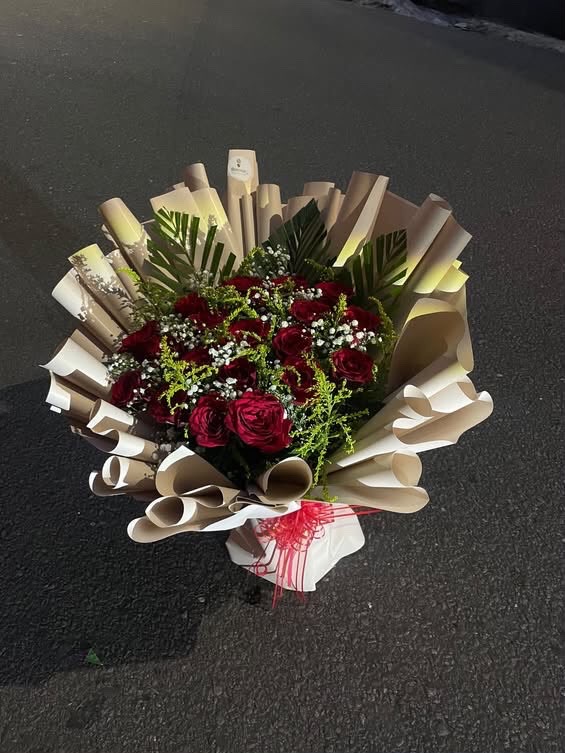A lush and elegant rose bouquet combining soft greenery and delicate fillers for a premium and graceful presentation.