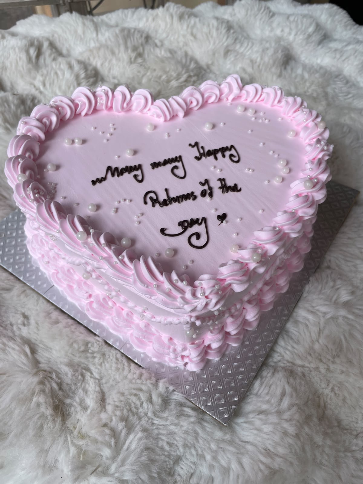 A delightful two-pound White Forest cake featuring a soft cake base, creamy layers, and an elegant finish. Its light and inviting presentation makes it a lovely centerpiece for birthdays and family celebrations.