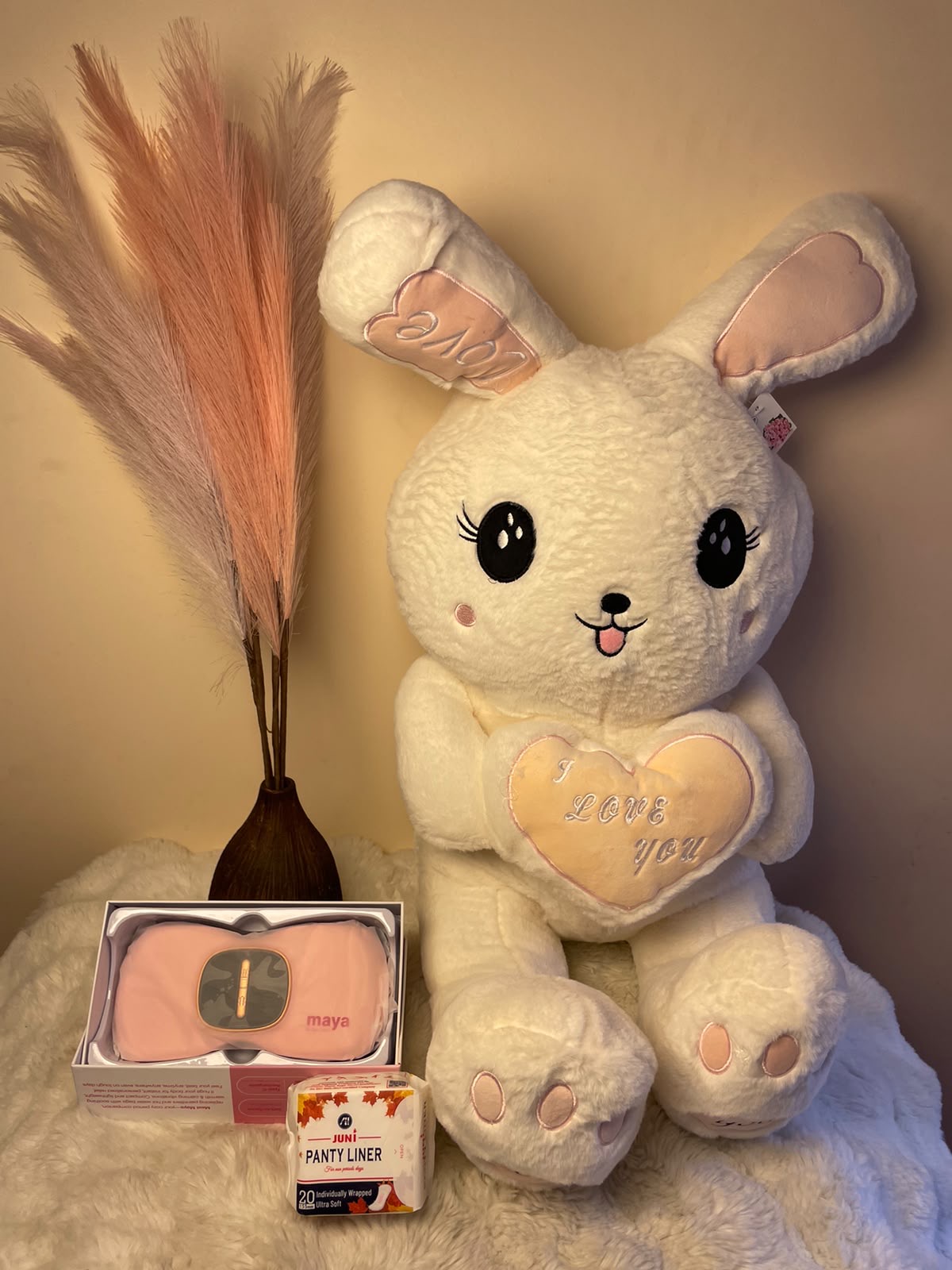 Comfort Bunny Hamper A cute and thoughtful combination featuring a rabbit doll, period relief belt, and panty liner.