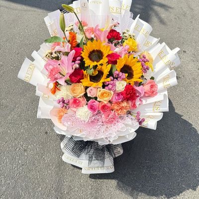 Radiant Celebration Bouquet 🌻🌸💐