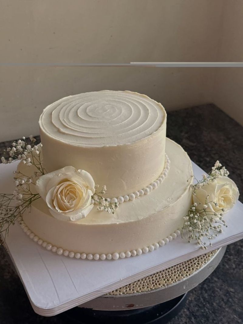 Elegant Two-Tier White Rose Celebration Cake
