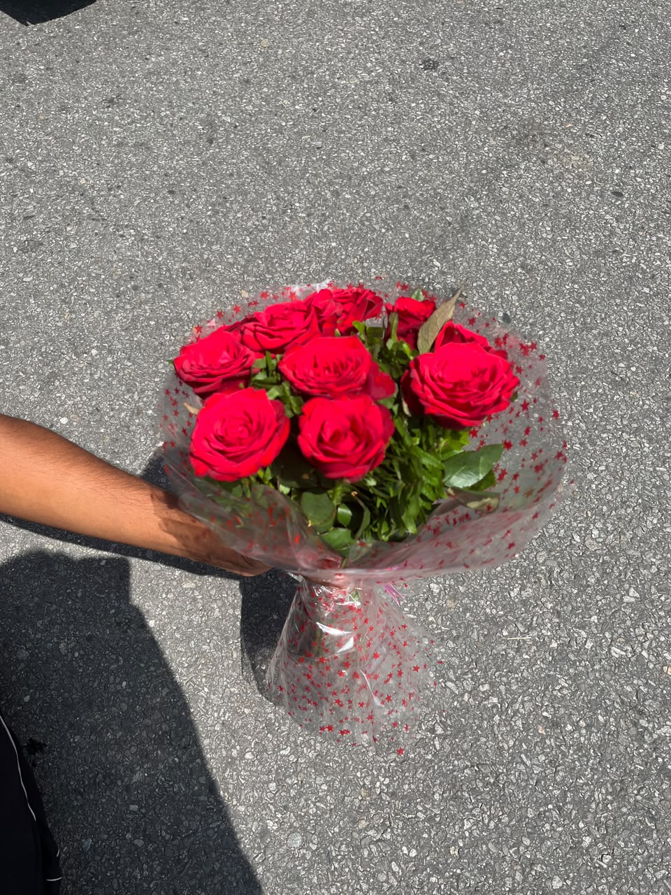 10-Stem Red Rose Bouquet with Clear Wrapping As flowers are natural products, the size, bloom stage, and wrapping style may vary slightly based on seasonal availability while maintaining the same freshness and elegant presentation.