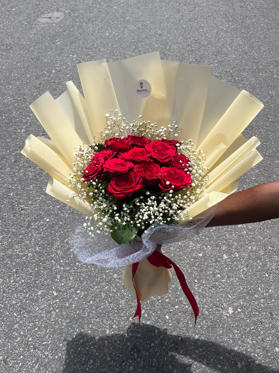 As flowers are natural products, the bloom stage, rose size, and wrapping style may vary slightly based on seasonal availability while maintaining the same freshness and elegant presentation.