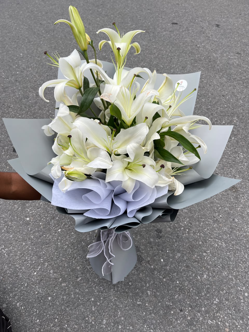 Classic 5-Stem Lily Bouquet As flowers are natural products, the bloom stage, flower color, and wrapping style may vary slightly based on seasonal availability while maintaining the same freshness and elegant presentation. Lilies may arrive in buds to ensure longer-lasting beauty after delivery.