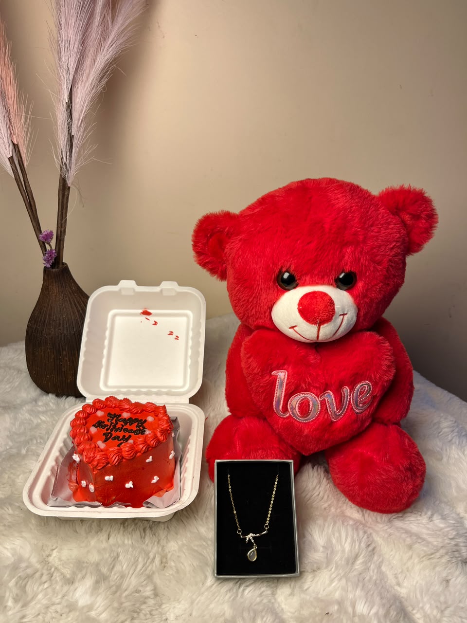 The doll and necklace design may vary based on availability while maintaining the same quality and overall aesthetic. The cake is freshly prepared and should be refrigerated until ready to serve.