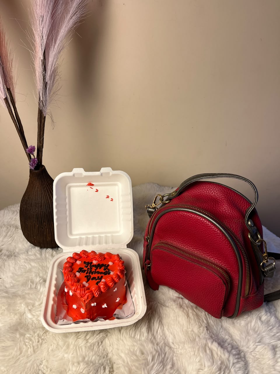 The bag design, color, and style may vary based on availability while maintaining the same quality and overall aesthetic. The cake is freshly prepared and should be refrigerated until ready to serve.