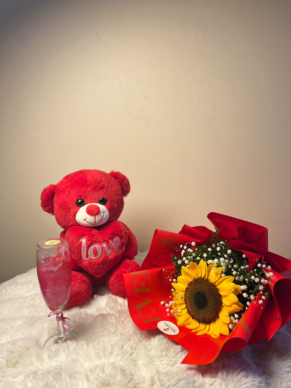The teddy bear design, bouquet arrangement, and candle packaging may vary slightly based on availability while maintaining the same quality and overall theme.