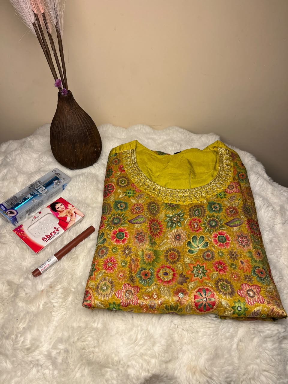 The kurta design, color, size, tika style, and makeup shades may vary based on availability while maintaining the same quality and overall gifting appeal.
