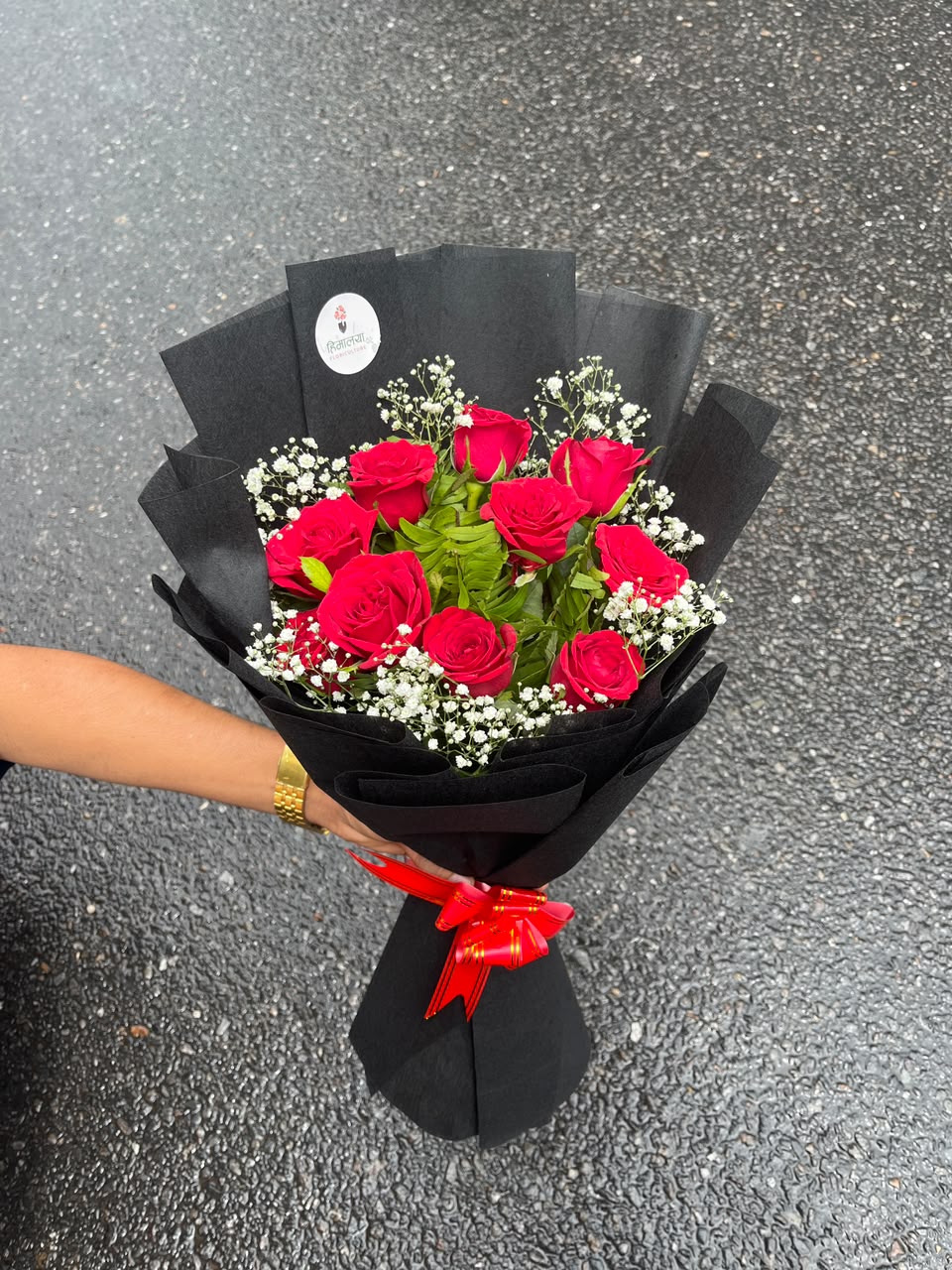 Rose bloom size, flower shades, filler flowers, and wrapping may vary slightly depending on seasonal availability while maintaining the bouquet's overall style, quality, and value.