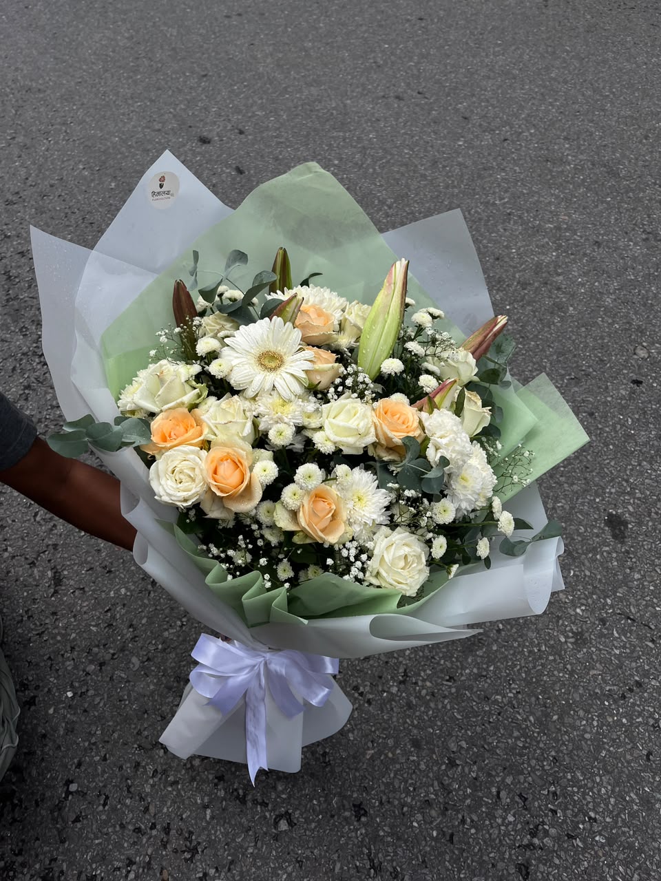 Bloom size, flower shades, flower varieties, filler flowers, and wrapping may vary slightly depending on seasonal availability while maintaining the bouquet's overall style, quality, and value.