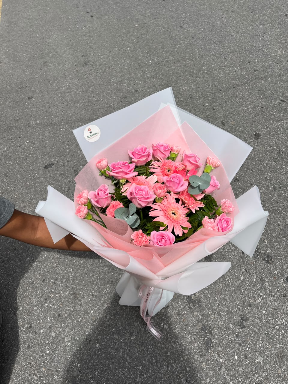 Flower varieties, shades, and wrapping may vary slightly depending on seasonal availability while maintaining the bouquet's overall style, quality, and value.