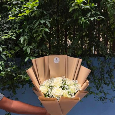 12 White Roses with Premium Wrapping