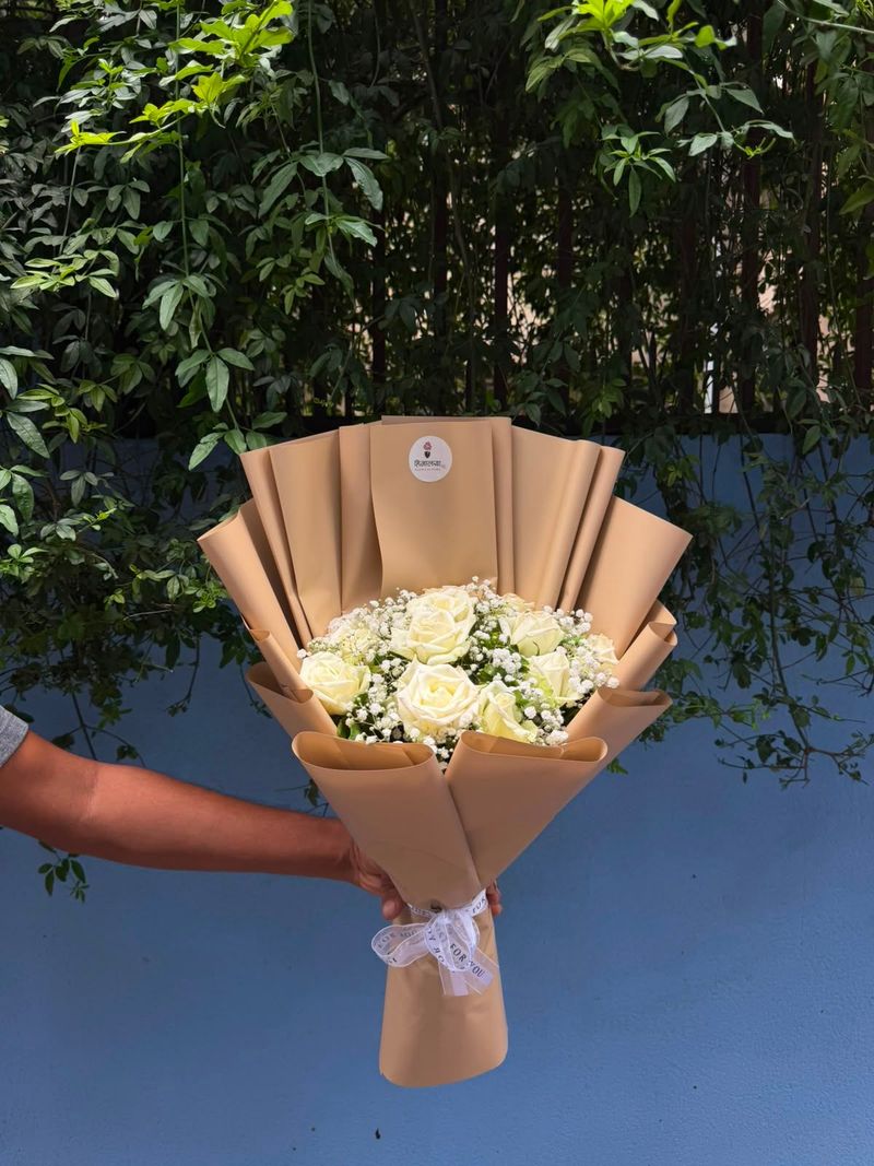 12 White Roses with Premium Wrapping
