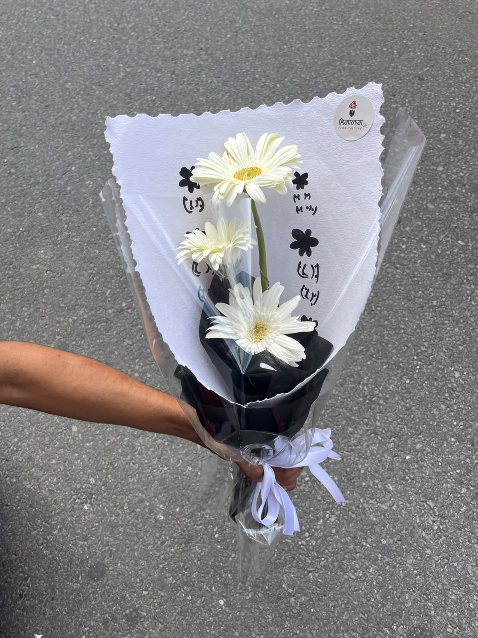 Flowers are natural products, so slight variations in color, bloom size, and arrangement may occur. Wrapping paper, ribbons, greenery, and fillers may be substituted with similar premium materials based on seasonal availability while maintaining the overall design and quality of the bouquet.