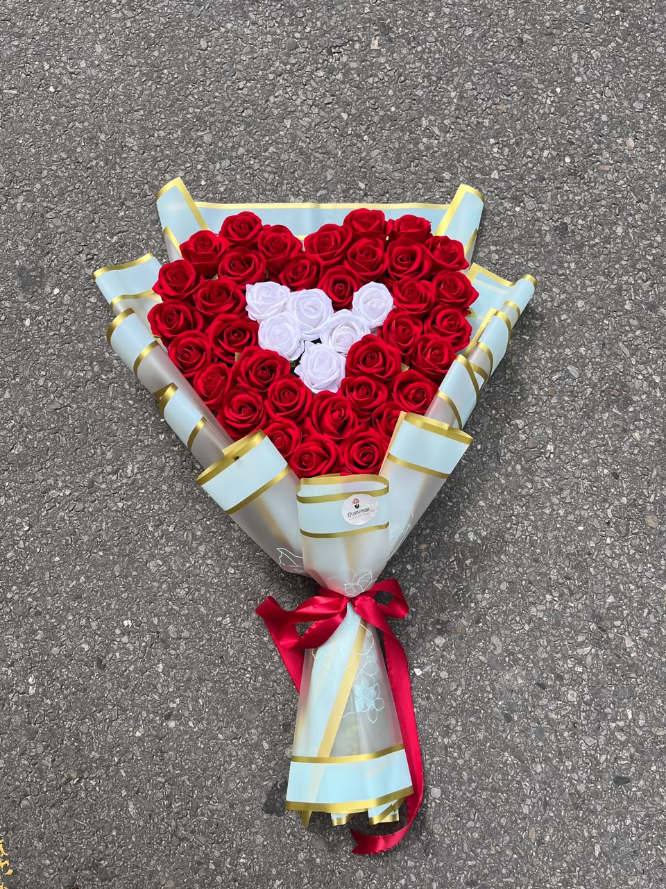 Forever Love 40 Artificial Roses Heart Design This product is made with artificial flowers and is intended for decorative purposes only. Slight variations in color, size, arrangement, and finishing may occur due to handmade craftsmanship.