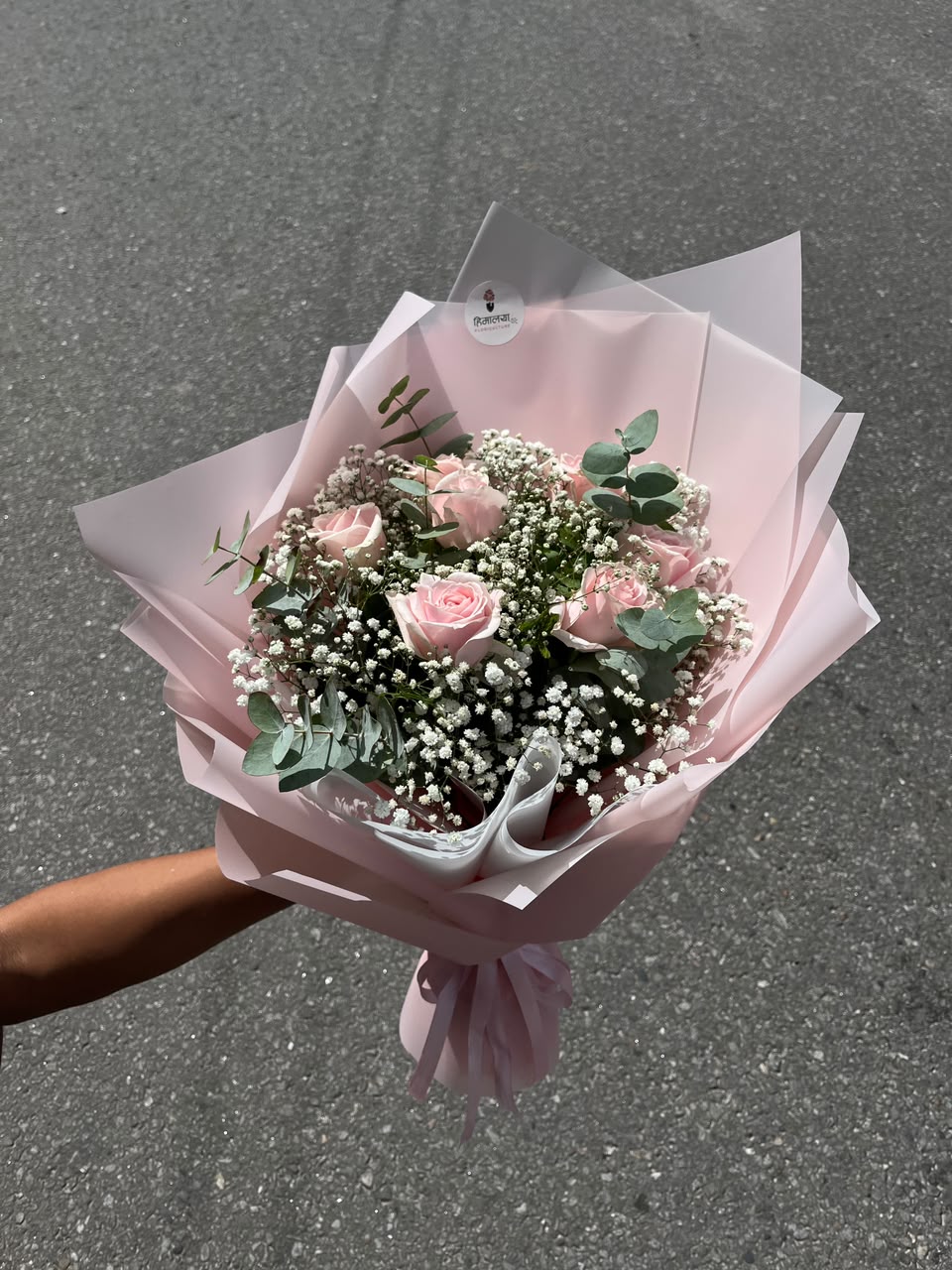 Delicate Pastel Pink Rose Bouquet Flowers are natural products, so slight variations in color, bloom size, and arrangement may occur. Silver dollar foliage and other fillers may be replaced with similar premium greenery based on seasonal availability while maintaining the overall look and quality of the bouquet.