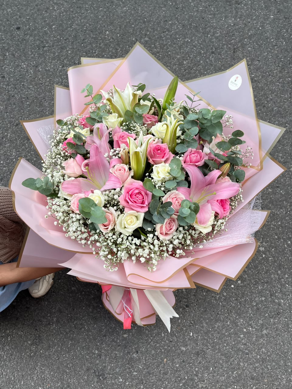 Flower colours, varieties, bloom size, and wrapping may vary slightly depending on seasonal availability. As flowers are natural products, the bouquet delivered may differ from the product image while maintaining the same overall design, quality, and value.