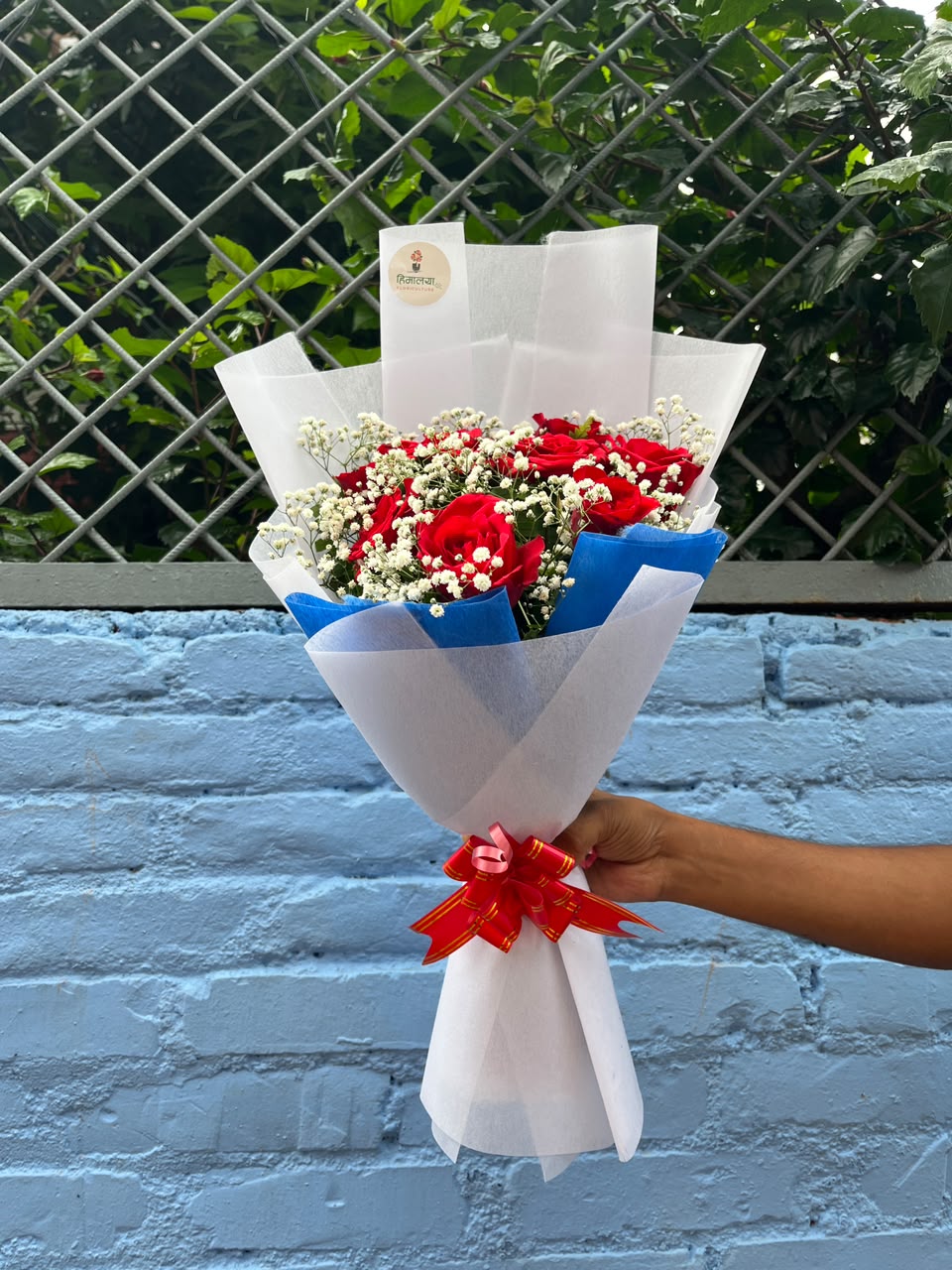 Flower colour, size, shape, and bloom stage may vary slightly due to natural characteristics and seasonal availability. Gypsy flowers, greenery, and wrapping colours may also vary slightly while maintaining the overall design, quality, and value of the bouquet.