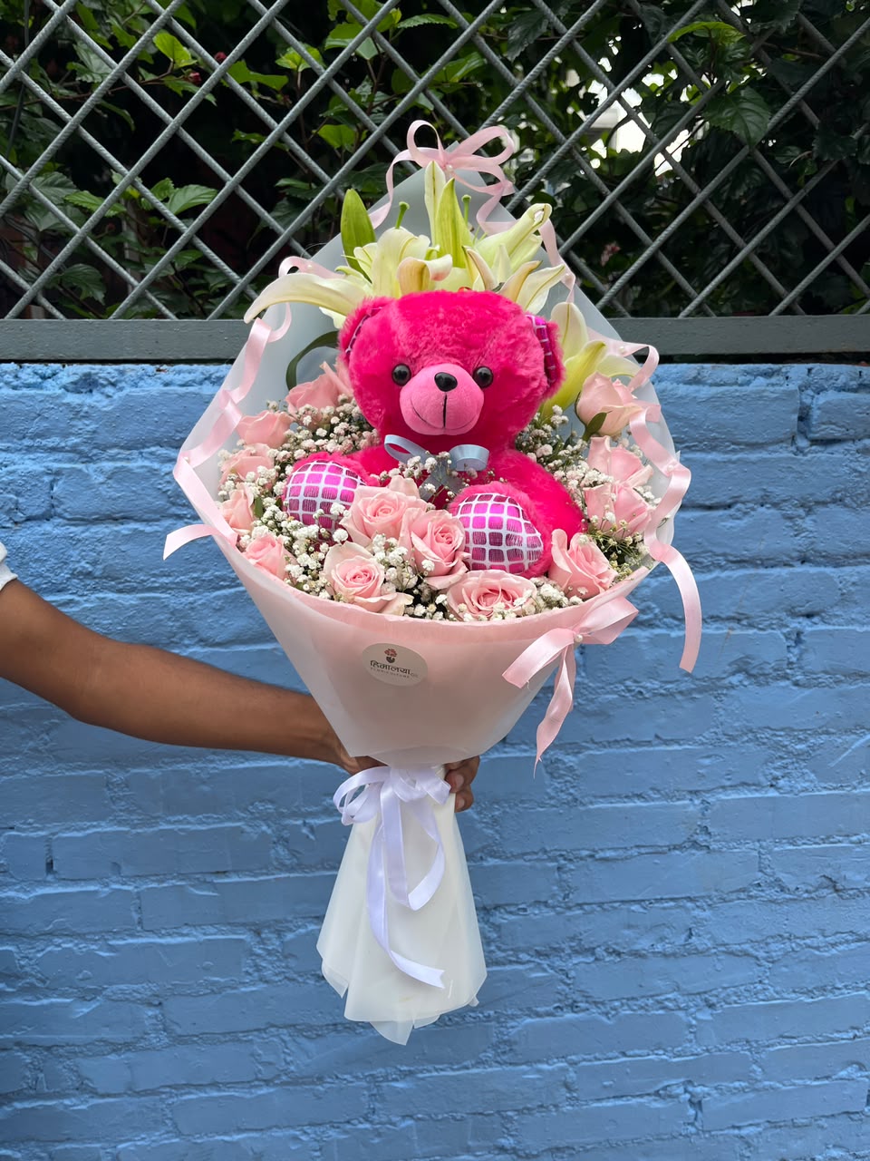 Soft Petals & Hugs Flower shades and fillers may differ slightly due to seasonal availability while maintaining the bouquet's overall look and value.