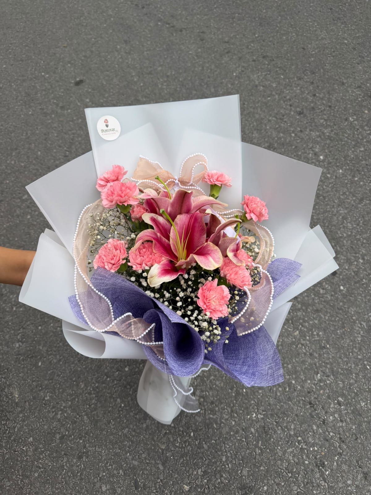 Flower shades, size, and bloom stage may vary slightly depending on seasonal availability. The arrangement may have natural variations while maintaining the stated flower quantity and overall design.
