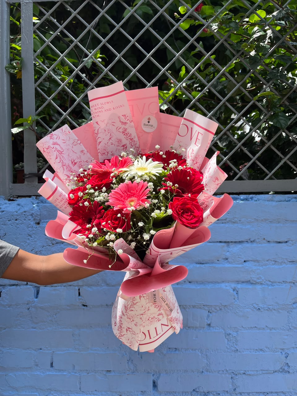Petal Fusion Gerbera colors may vary depending on seasonal availability and stock. Flower varieties, colors, wrapping materials, ribbons, and decorative elements may also be replaced with similar alternatives based on availability. Customization is available according to preference and budget