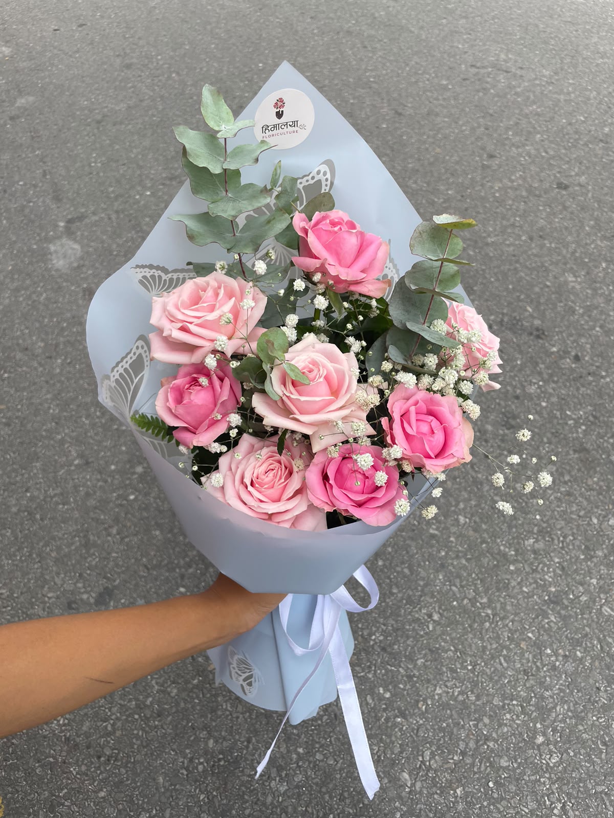 Rose shades, wrapping materials, ribbons, and decorative elements may vary slightly depending on seasonal availability and stock. The bouquet can be customized according to your preferred flower colors, wrapping style, arrangement, and budget, subject to availability.