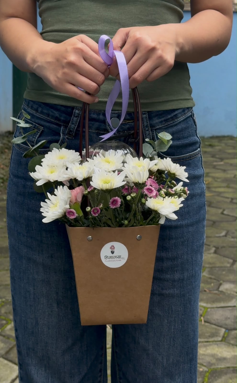 Matcha & Daisies – Sweet Little Surprise Flower varieties, colors, and sizes may vary depending on seasonal availability while maintaining the overall look, quality, and value of the arrangement. As flowers are natural products, slight variations in shape, size, and bloom stage are normal. The iced matcha drink and its presentation may vary depending on availability. Cardboard bag design and color may also differ slightly from the product image.