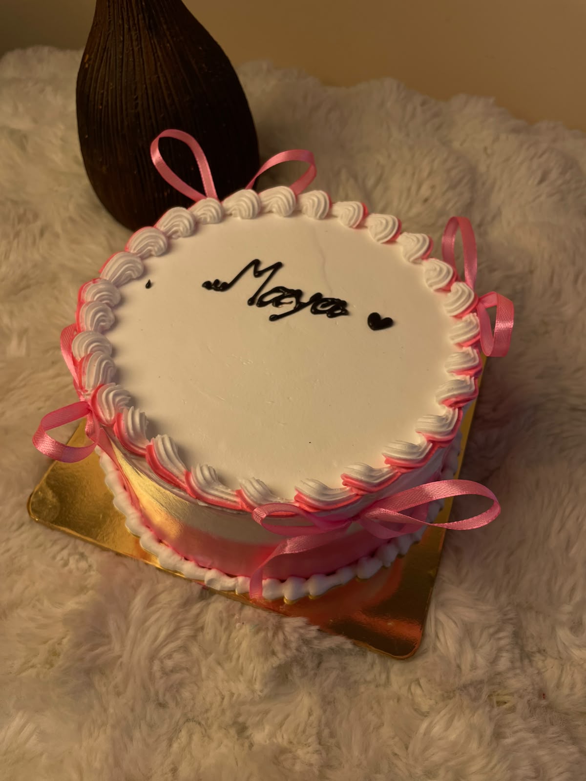 Cake design, decorations, and shade of pink may vary slightly depending on availability and the baker's finishing style. As each cake is handcrafted, minor variations in appearance are natural. The actual cake may differ slightly from the product image while maintaining the same overall theme, quality, and value. Please check the cake's ingredients and allergen information before consumption.