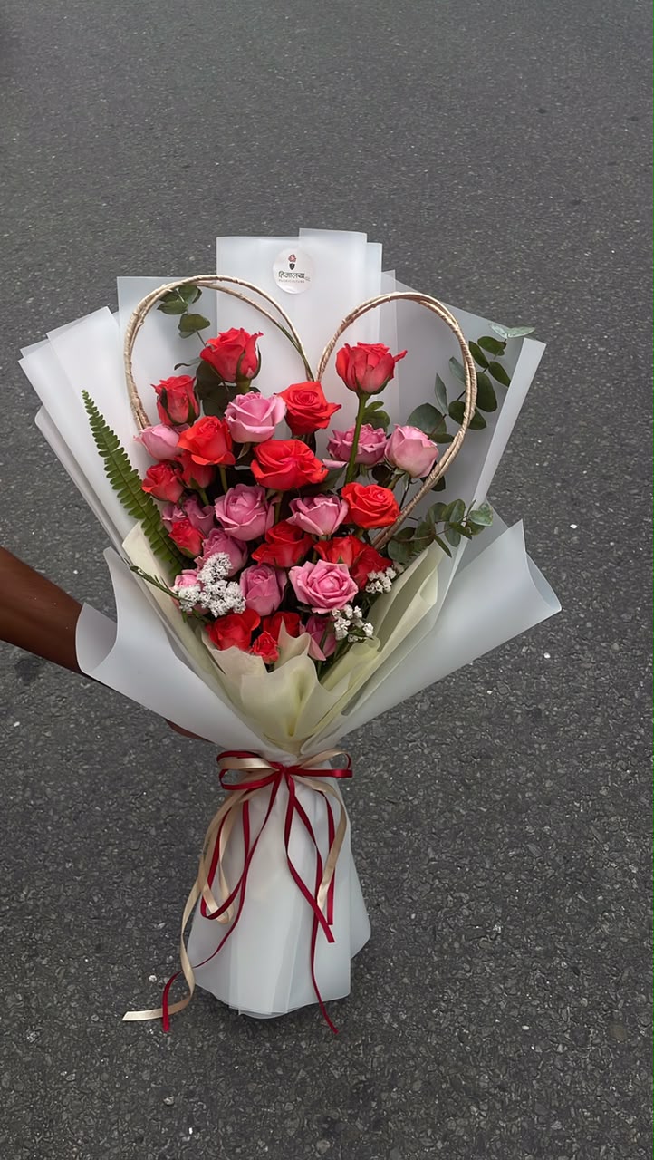 Rose Heart Romance Flower colors, varieties, and availability may vary slightly depending on seasonal availability. The arrangement may have minor variations from the product image while maintaining the overall design and value.