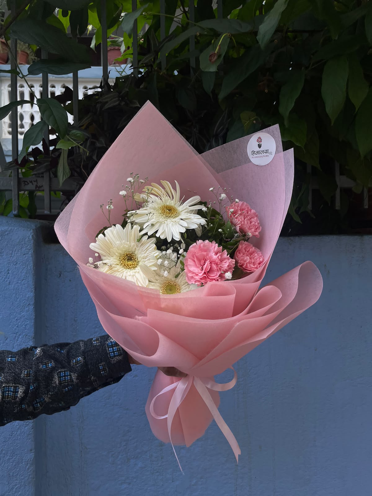 Flower shades, bloom size, and arrangement may vary slightly depending on seasonal availability and freshness. The butter wrapper can be selected in various shades based on availability.