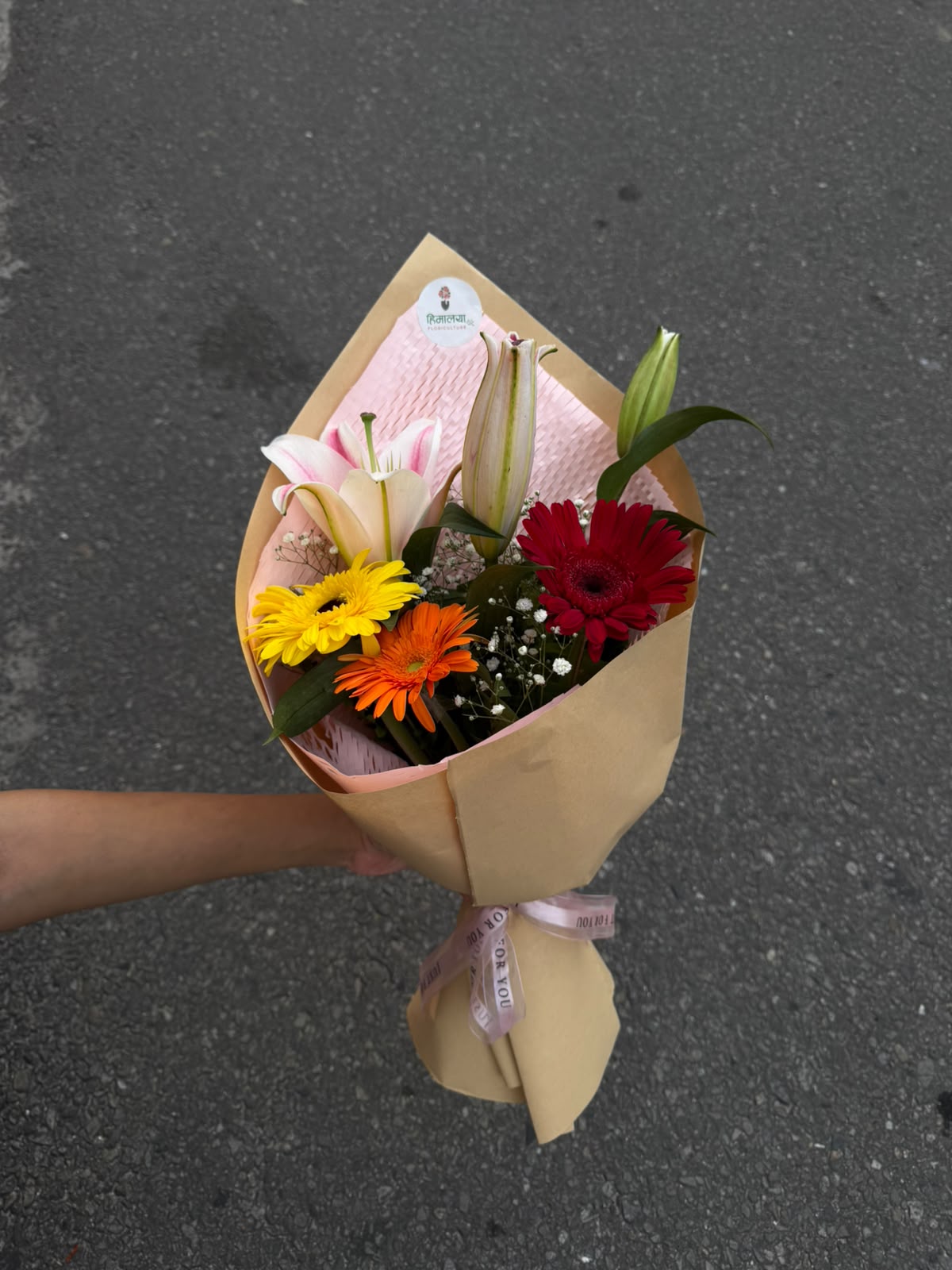 Flower colors, bloom size, and arrangement may vary slightly depending on seasonal availability and freshness. If any flower or wrapping material is unavailable, it may be replaced with a similar option while maintaining the overall look and value of the bouquet.