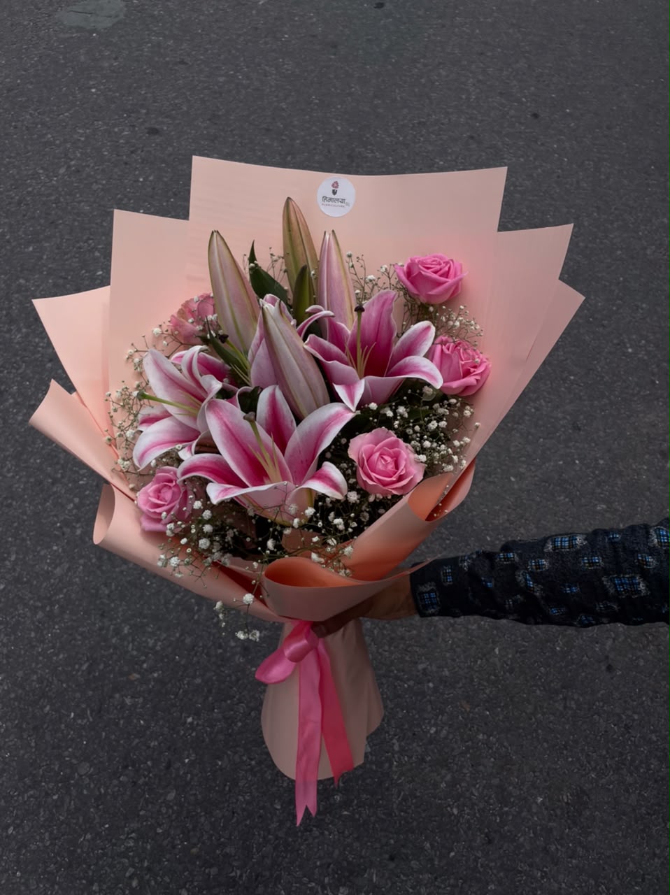 Pink Petal Dream Flower shades, bloom size, and arrangement may vary slightly depending on seasonal availability and freshness. If any flower or wrapping material is unavailable, it may be replaced with a similar option while maintaining the overall look and value of the bouquet.