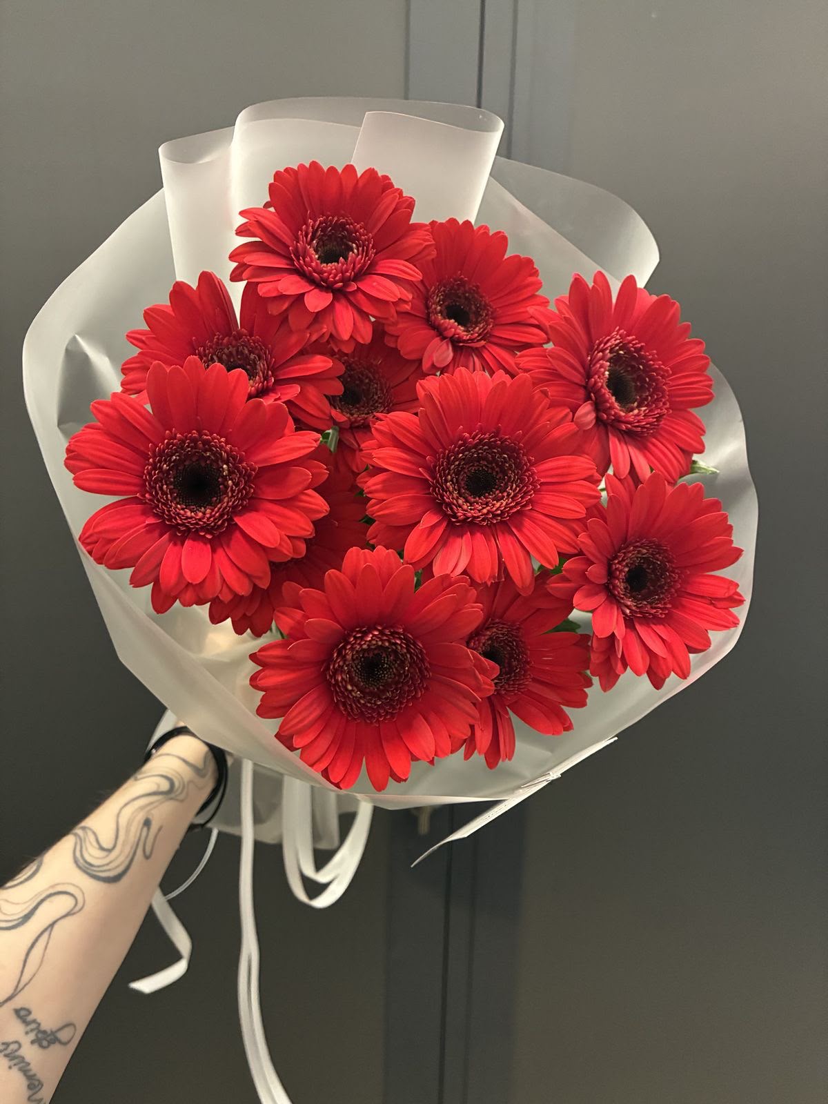 Red Gerbera Delight Flower shades, size, and arrangement may vary slightly depending on seasonal availability and the freshness of the flowers. In case a particular flower or wrapping material is unavailable, we may replace it with a similar option while maintaining the overall look and value of the bouquet.