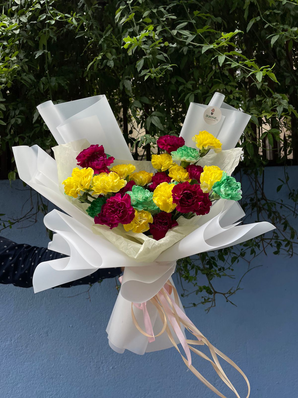Flower colors, sizes, and availability may vary depending on the season and market availability. If a specific flower or color is unavailable, it may be replaced with a similar flower or shade while maintaining the overall look and value of the bouquet.