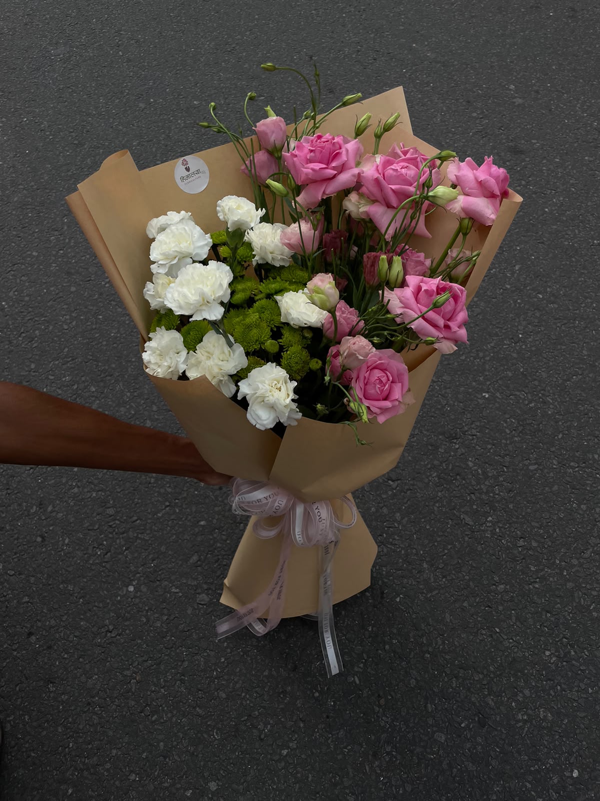 Flower appearance, greenery, wrapping, and bloom size may vary slightly depending on seasonal availability.
