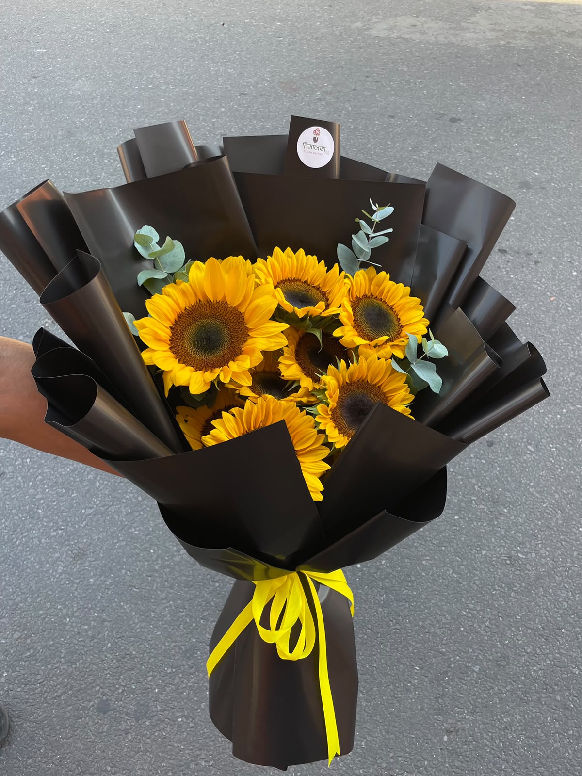 Sunflower color, size, bloom stage, greenery, and wrapping may vary slightly depending on seasonal availability. 