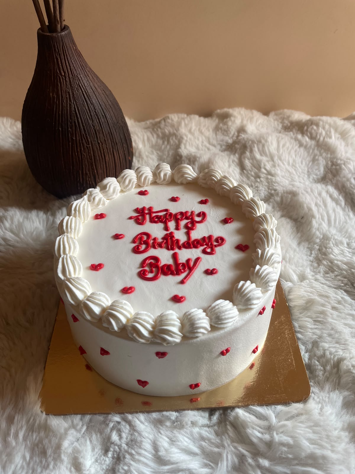 Sweetheart White Forest Cake The cake’s design, cream decoration, and heart patterns may vary slightly depending on the baker’s finishing touches.