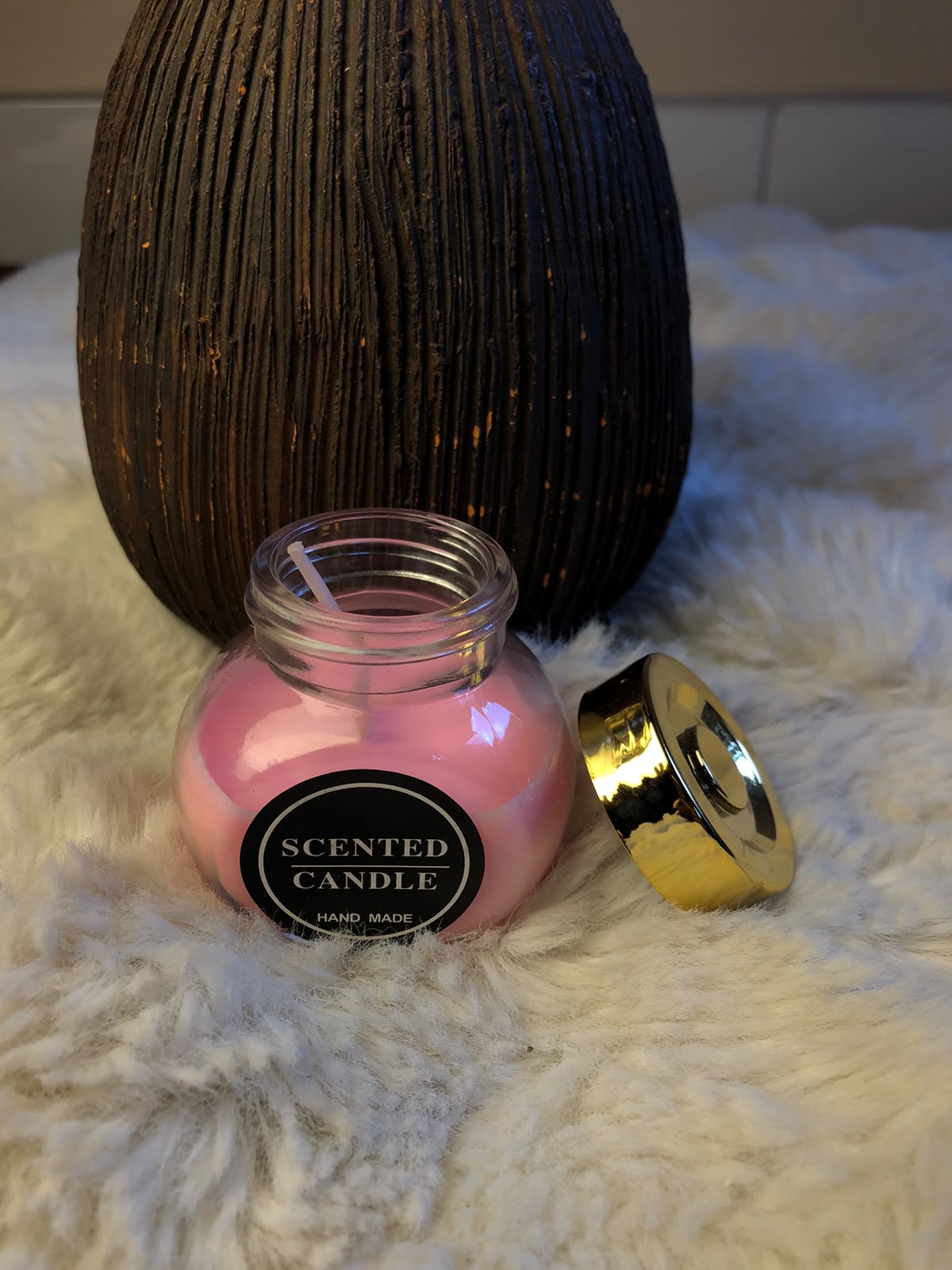 Fragrance, color, and appearance may vary slightly depending on the product and lighting conditions. Never leave a burning candle unattended. Keep away from children, pets, flammable materials, and drafts. Place on a stable, heat-resistant surface and allow the candle container to cool before handling. Burn within sight and follow the recommended candle safety instructions.