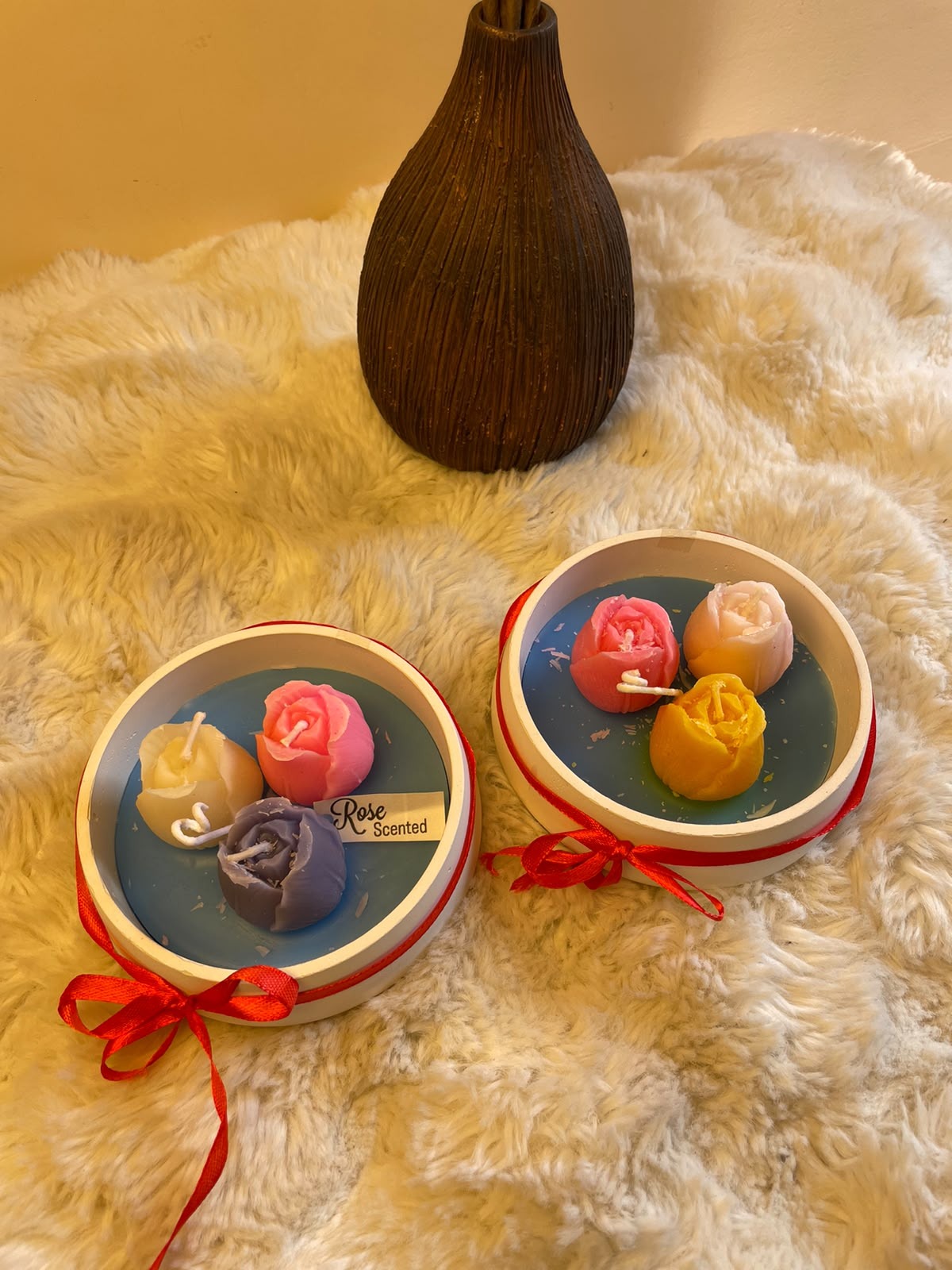 The candle's colors, shape, and finish may vary slightly due to lighting. Never leave a burning candle unattended. Keep away from children, pets, and flammable materials, and place on a stable, heat-resistant surface. Burn within sight and follow all recommended candle safety instructions.