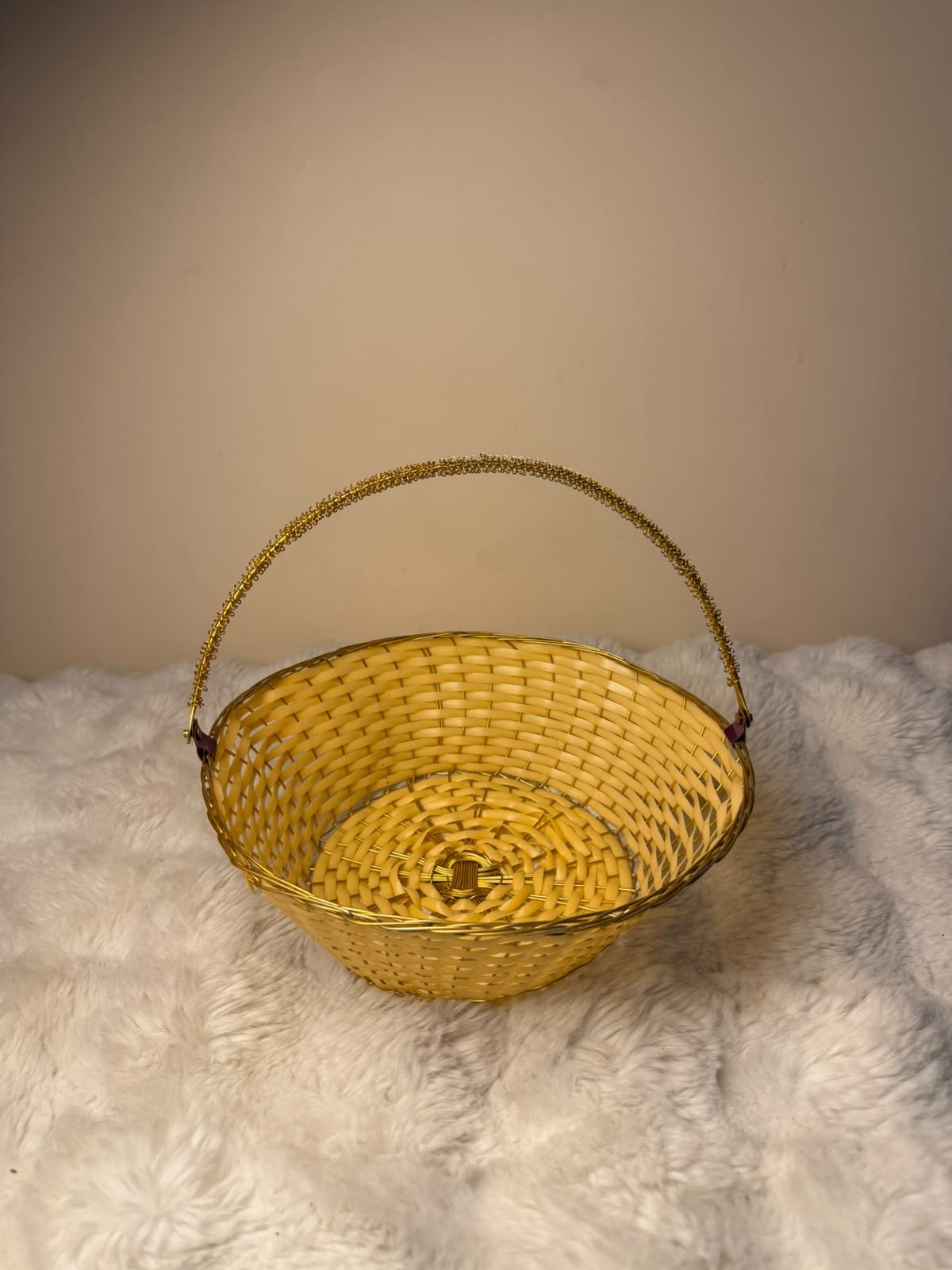 This basket is made of plastic with a bamboo-style appearance, not natural bamboo. Slight variations in color and finish may occur.